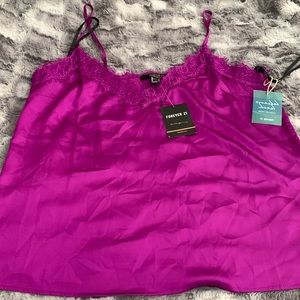 Purple Spaghetti strap top. Faux silk. With lace detail.